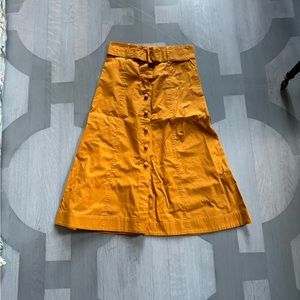 SEA orange cotton skirt with belt. Size 8. Runs small.